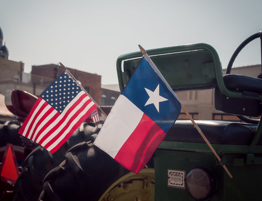 Amerikanska flaggan och Texas flagga